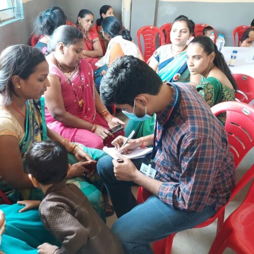 journalists interviewing community members