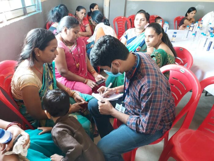 journalists interviewing community members