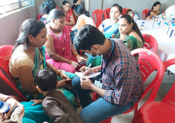 journalists interviewing community members