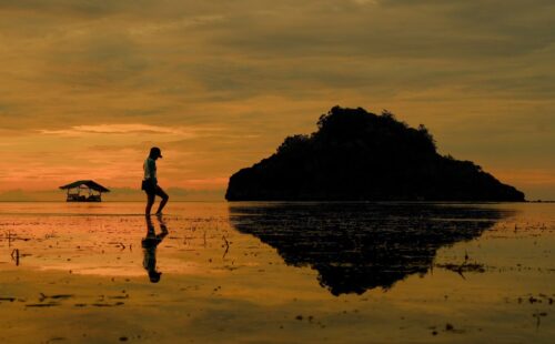 Carmela walks along the coast of Negros Occidental Photo credit PRRCFI