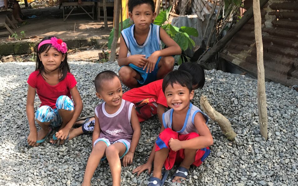 Children play in an area where Pure Earth cleaned up lead contamination in Pampanga, Philippines. Photo credit: Pure Earth