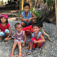 Children play in an area where Pure Earth cleaned up lead contamination in Pampanga, Philippines. Photo credit: Pure Earth
